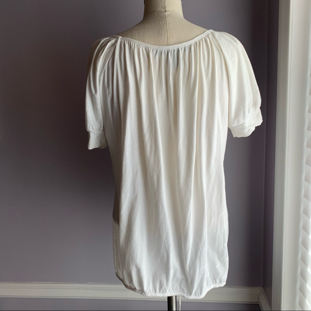 Karen Kane white cotton V neck blouson top purple laser cut flowers puff sleeves - Picture 5 of 15